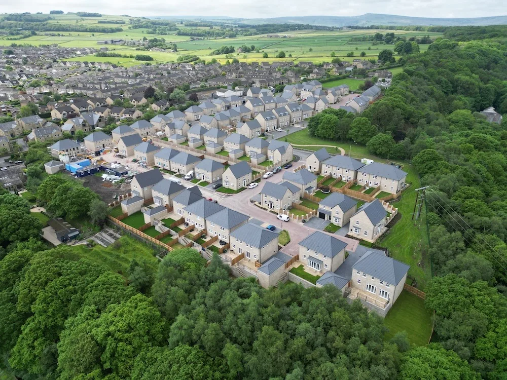 Drone photograph of a new stone-built housing development where Bond Brickwork laid the brick