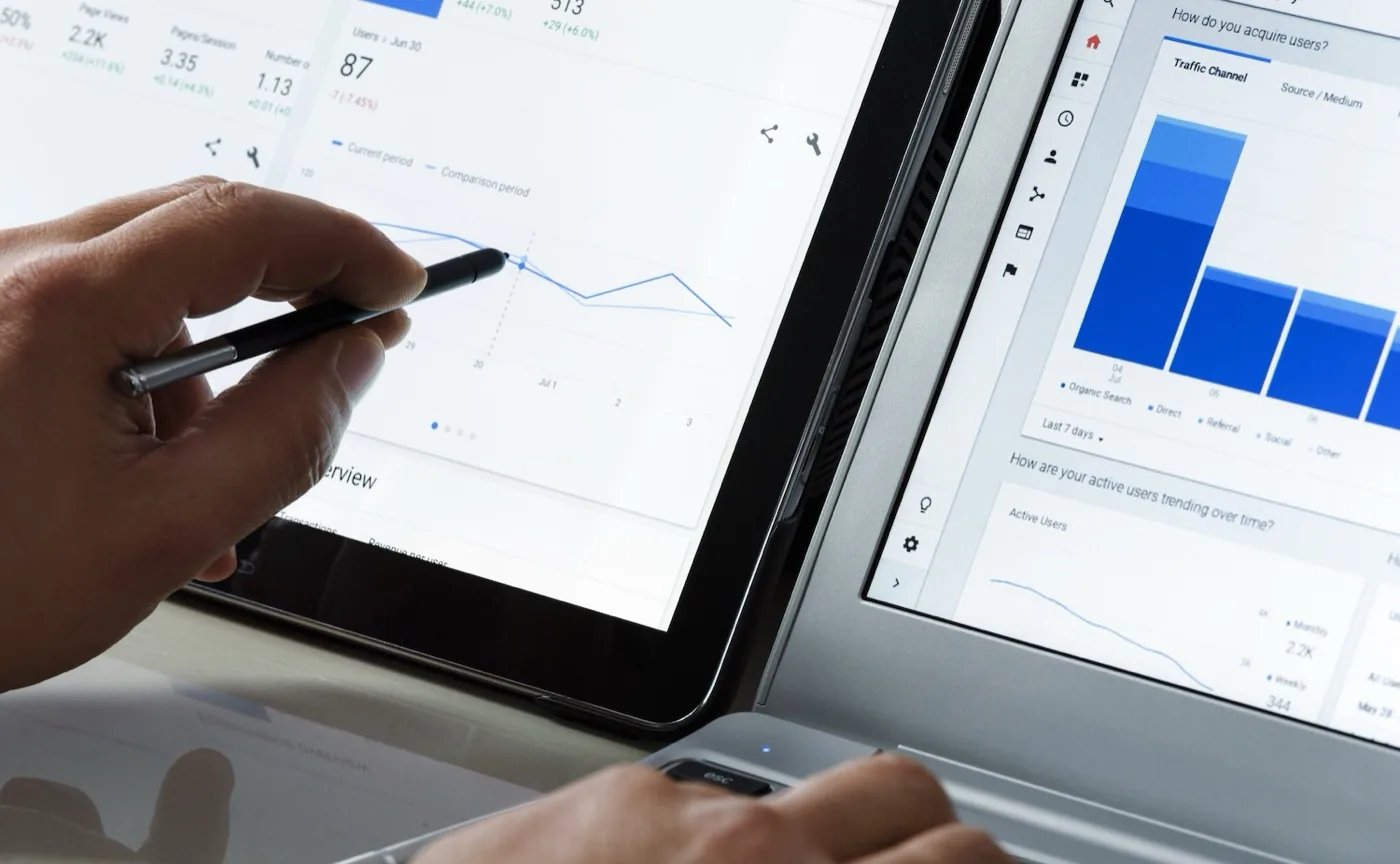 Search and traffic reports being checked on a tablet and a laptop